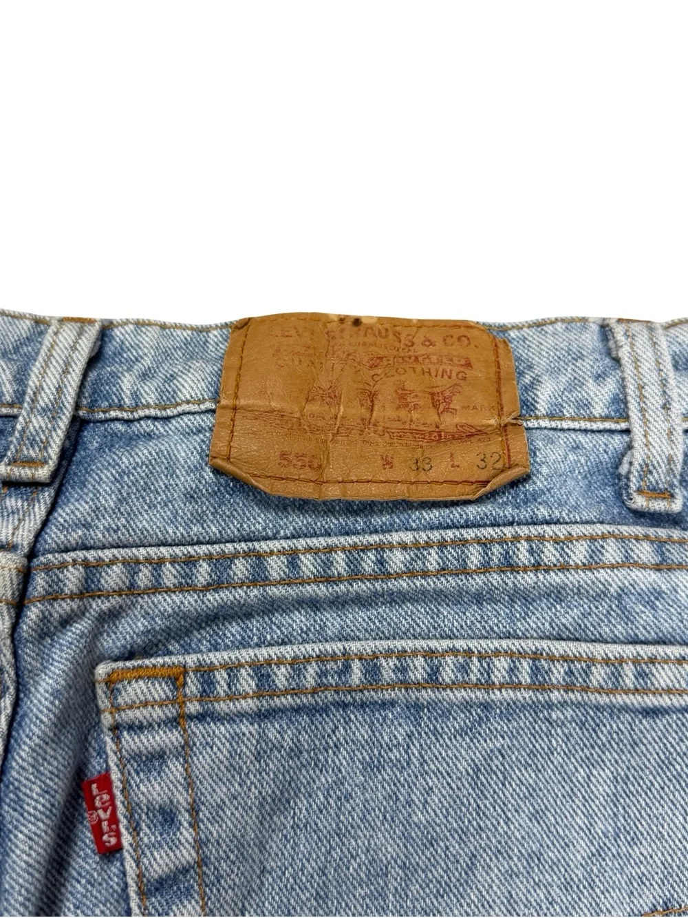 Vintage 90s Levi’s 550 Made In USA Light Wash Elongated Jean Shorts Size 33